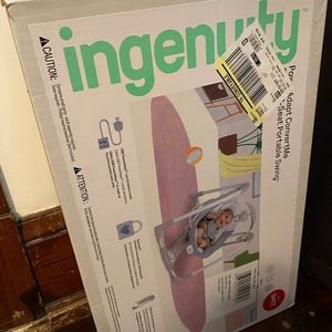Multicolored , brand new , box never opened , baby swing ..